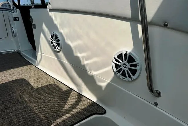  Yacht Photos Pics 2004 Silverton 35 MY Aft Cabin Motoryacht interior with speakers and carpeted floor.