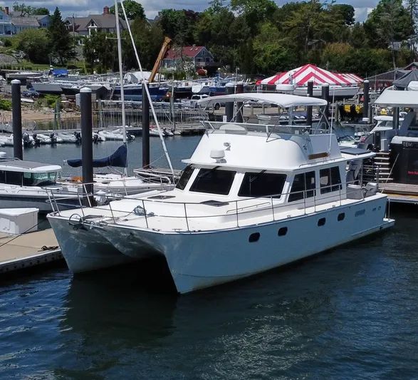 Audrey Louisa Yacht Photos Pics 2012 Maine Cat Power Cat 47 docked at a marina.