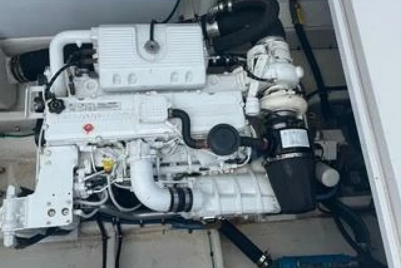  Yacht Photos Pics Engine of a 2019 OceanPro 35 boat, showcasing intricate mechanical components.