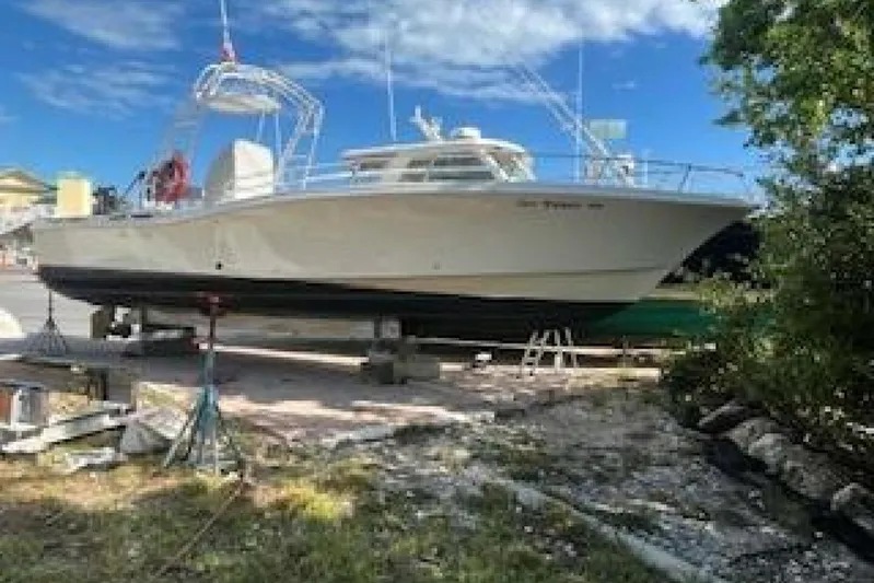  Yacht Photos Pics 2019 OceanPro 35 boat on dry dock under a clear blue sky.