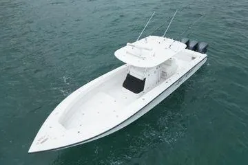 Last Resort Yacht Photos Pics 2013 Bahama 41 Open Fisherman boat on water, featuring triple outboard engines.