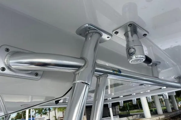 Last Resort Yacht Photos Pics Close-up of 2013 Bahama 41 Open Fisherman boat's metal framework and fittings.