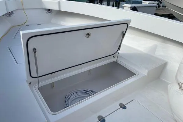 Last Resort Yacht Photos Pics Open storage compartment on 2013 Bahama 41 Open Fisherman boat deck.