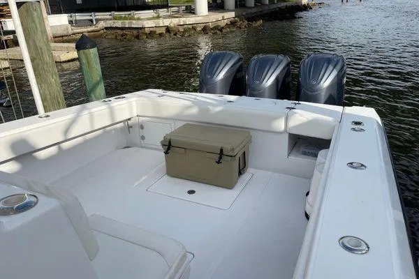 Last Resort Yacht Photos Pics 2013 Bahama 41 Open Fisherman boat with triple outboard engines and spacious deck.
