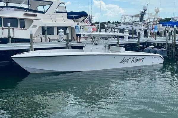 Last Resort Yacht Photos Pics 2013 Bahama 41 Open Fisherman boat docked at marina, named "Lost Resort."