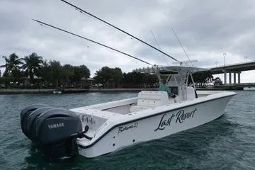Last Resort Yacht Photos Pics 2013 Bahama 41 Open Fisherman boat with Yamaha engines on a cloudy day.