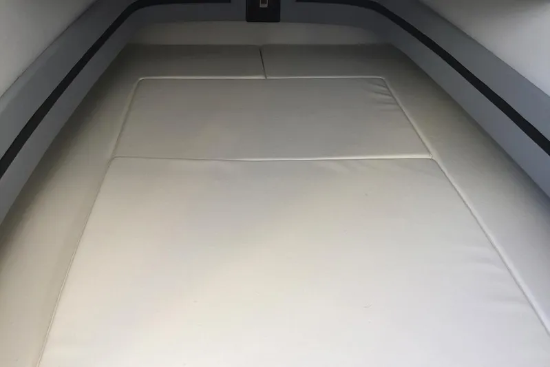  Yacht Photos Pics Manufacturer Provided Image: Interior cabin of 2021 Mystic Powerboats M3800 with cushioned seating.