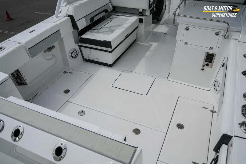  Yacht Photos Pics 2026 Blackfin 272 DC boat interior with spacious seating and modern amenities.