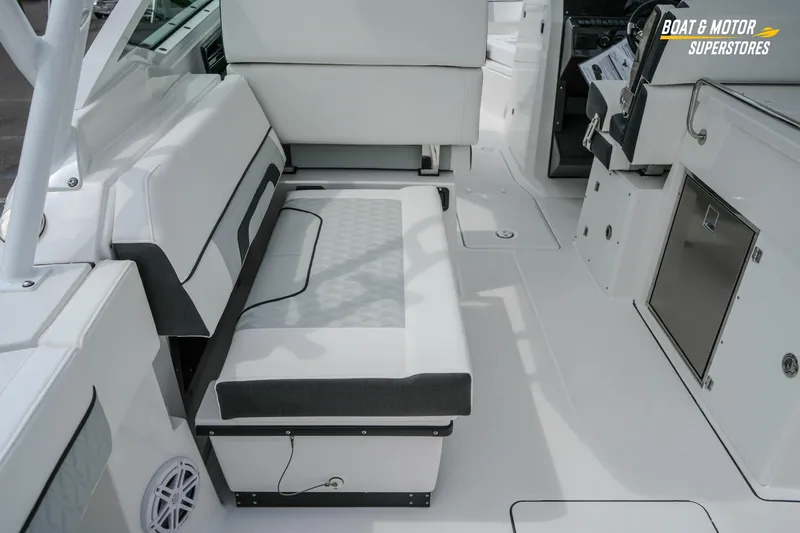  Yacht Photos Pics Interior of 2026 Blackfin 272 DC boat with white seating and modern design.