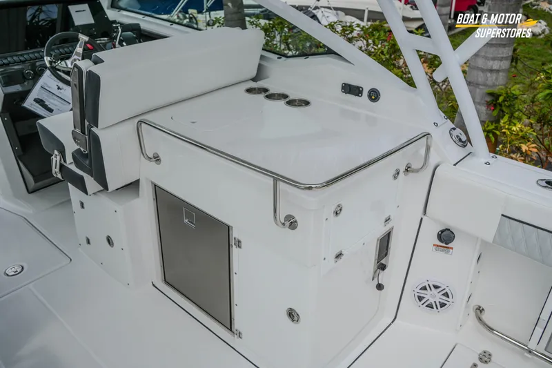  Yacht Photos Pics 2026 Blackfin 272 DC boat interior with seating and storage compartments.