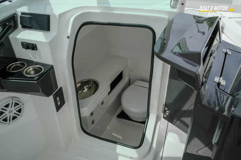  Yacht Photos Pics Interior of 2026 Blackfin 272 DC boat featuring a compact marine toilet.