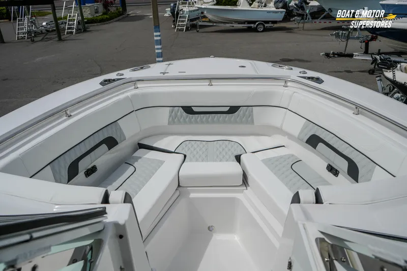  Yacht Photos Pics 2026 Blackfin 272 DC boat interior with luxurious seating and modern design.