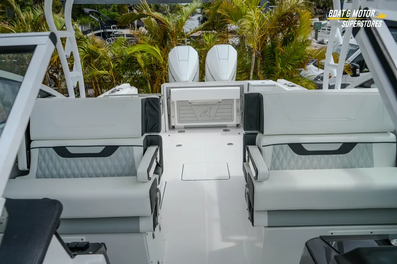  Yacht Photos Pics 2026 Blackfin 272 DC boat interior with luxurious seating and modern design.