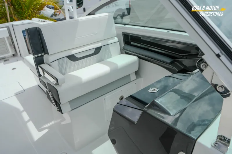  Yacht Photos Pics 2026 Blackfin 272 DC boat interior with sleek seating and modern design.