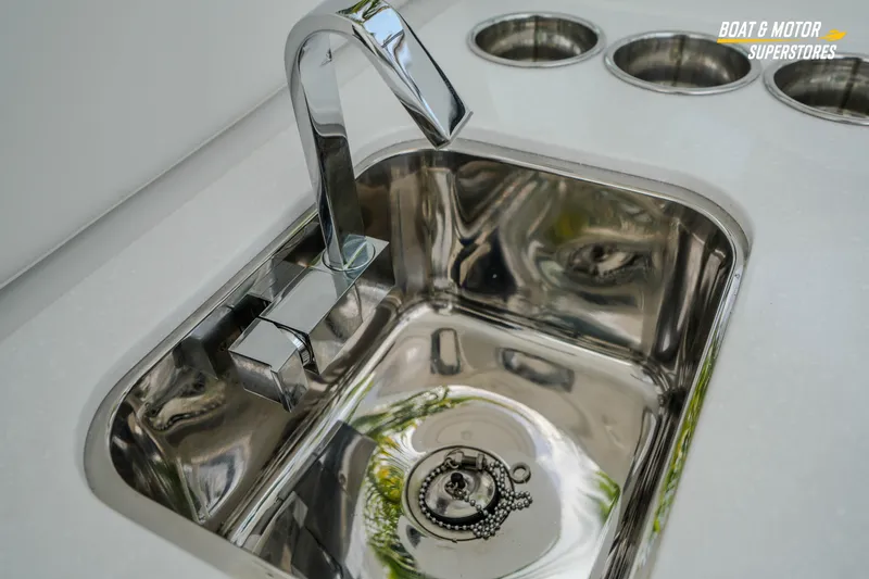  Yacht Photos Pics Stainless steel sink on 2026 Blackfin 272 DC boat, featuring modern faucet design.