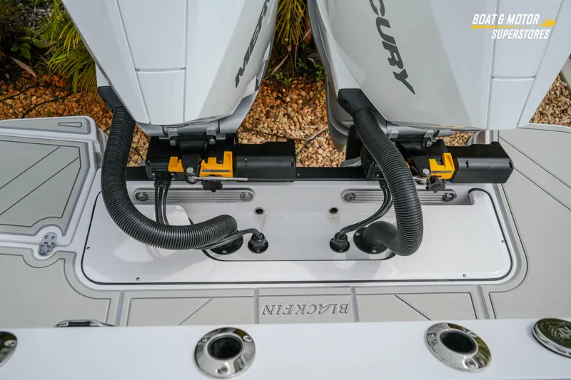  Yacht Photos Pics Twin Mercury outboard engines on a 2026 Blackfin 272 DC boat, showcasing advanced marine technology.