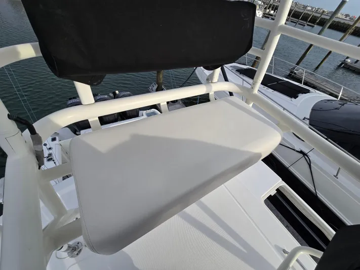  Yacht Photos Pics Boston Whaler 350 Outrage 2015 boat seat with marina view.