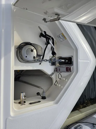  Yacht Photos Pics 2015 Boston Whaler 350 Outrage anchor compartment with winch and controls.