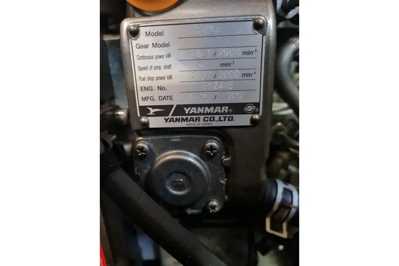 Yacht Photos Pics Yanmar engine plate on Jeanneau Sun Odyssey 409, 2013 model, showing specifications.
