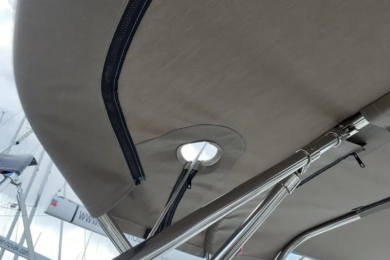  Yacht Photos Pics Bimini top and stainless steel frame on 2013 Jeanneau Sun Odyssey 409 sailboat.