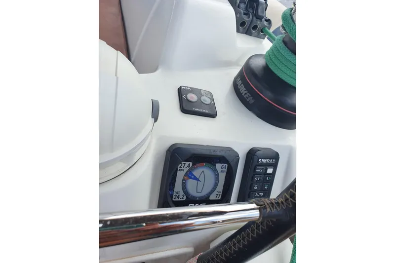  Yacht Photos Pics Control panel of 2013 Jeanneau Sun Odyssey 409 sailboat with navigation instruments.