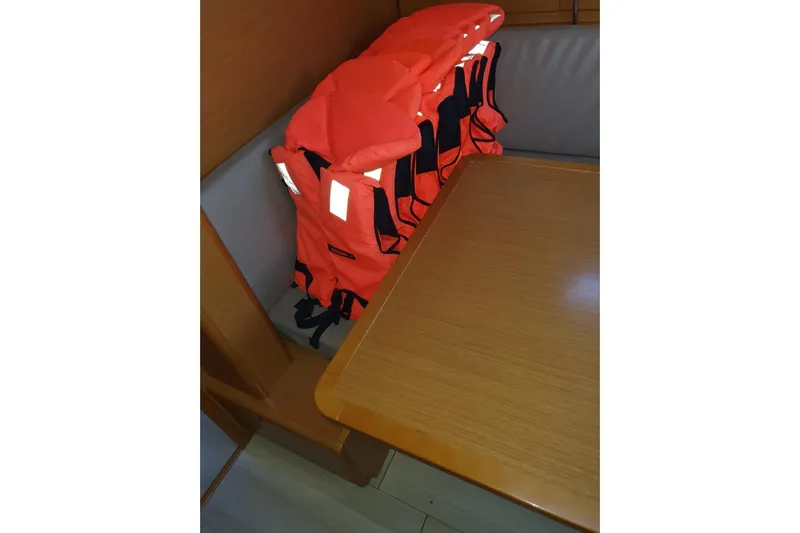  Yacht Photos Pics Orange life jackets on Jeanneau Sun Odyssey 409 yacht, 2013 model, interior view.
