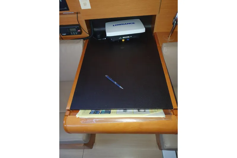  Yacht Photos Pics Navigation station on 2013 Jeanneau Sun Odyssey 409 with Lowrance equipment.