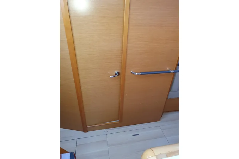  Yacht Photos Pics Interior wooden door of 2013 Jeanneau Sun Odyssey 409 yacht.