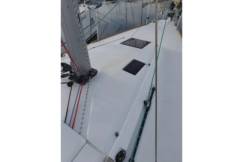  Yacht Photos Pics Deck view of 2013 Jeanneau Sun Odyssey 409 sailboat, showcasing rigging and hatches.