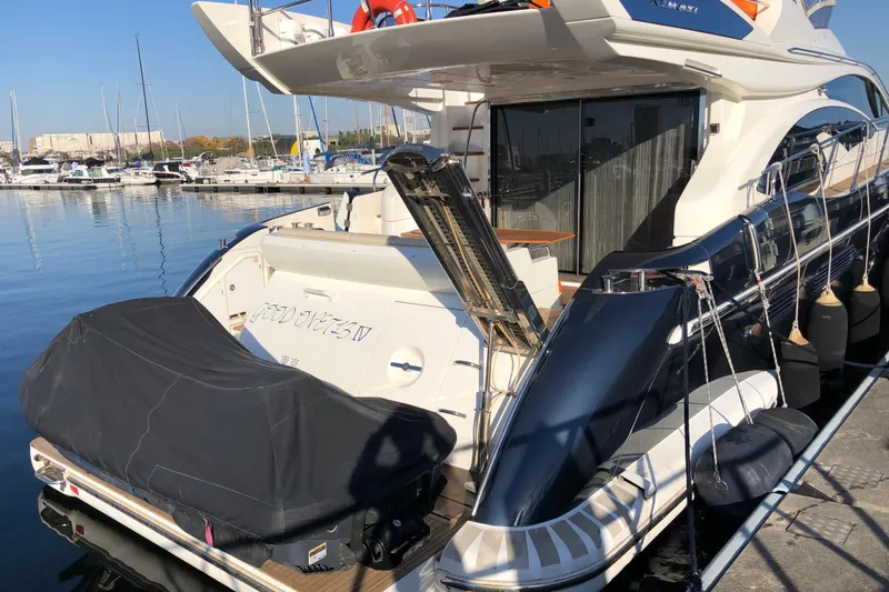  Yacht Photos Pics Azimut Fly 60 yacht docked at marina, rear view, 2014 model.