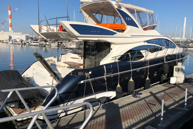  Yacht Photos Pics Luxury Azimut Fly 60 yacht docked at marina, 2014 model, sleek design.