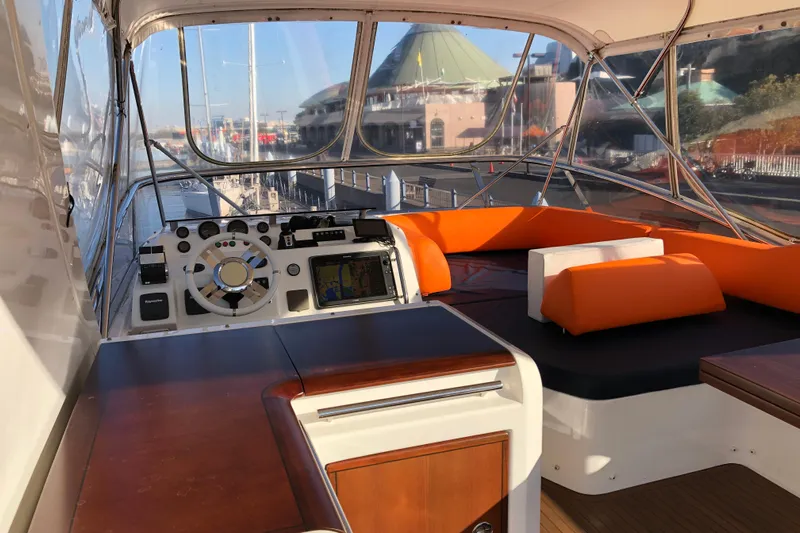  Yacht Photos Pics Luxurious 2014 Azimut Fly 60 yacht interior with modern helm and vibrant seating.