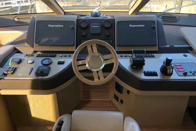  Yacht Photos Pics Cockpit of 2014 Azimut Fly 60 yacht with Raymarine navigation systems.