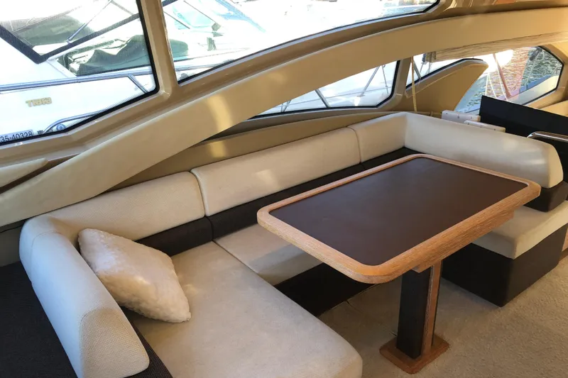  Yacht Photos Pics Luxurious interior of 2014 Azimut Fly 60 yacht with elegant seating and table.