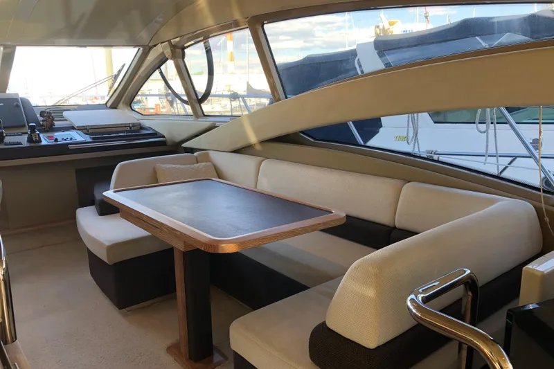  Yacht Photos Pics Luxurious interior of 2014 Azimut Fly 60 yacht with elegant seating and table.