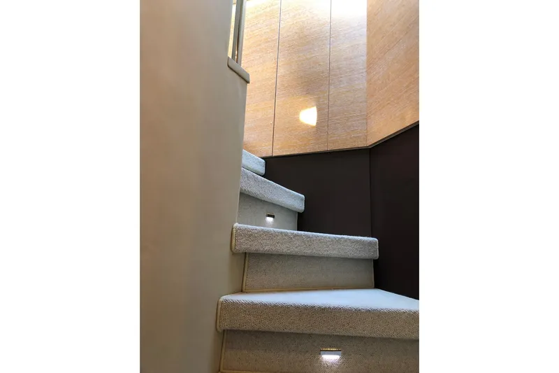  Yacht Photos Pics Staircase inside 2014 Azimut Fly 60 yacht, featuring modern design and lighting.