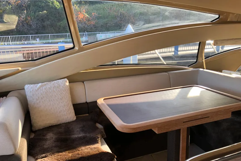  Yacht Photos Pics Luxurious interior of 2014 Azimut Fly 60 yacht with elegant seating and table.