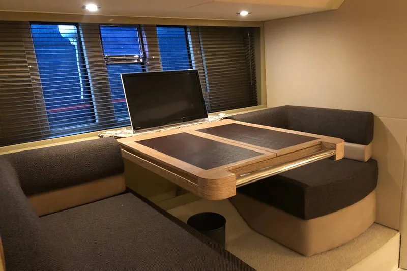  Yacht Photos Pics Luxurious interior of 2014 Azimut Fly 60 yacht with modern seating and table.