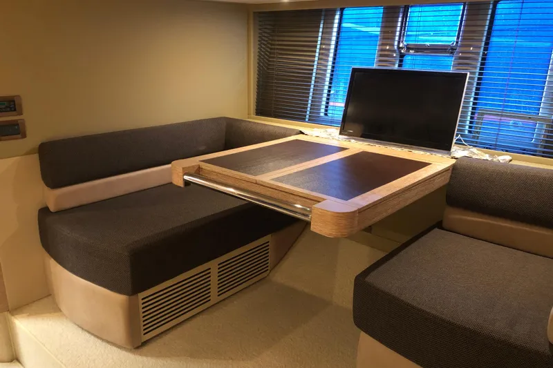  Yacht Photos Pics Luxurious interior of 2014 Azimut Fly 60 yacht with modern seating and table.