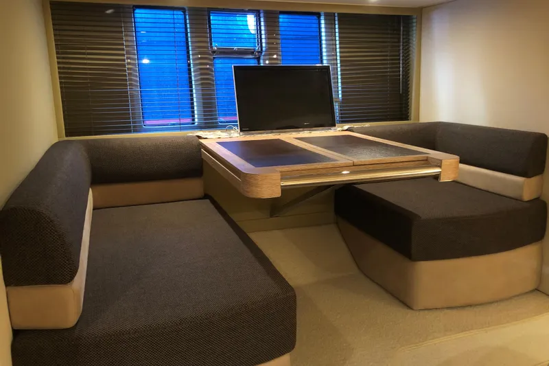  Yacht Photos Pics Luxurious interior of 2014 Azimut Fly 60 yacht with cozy seating and table.