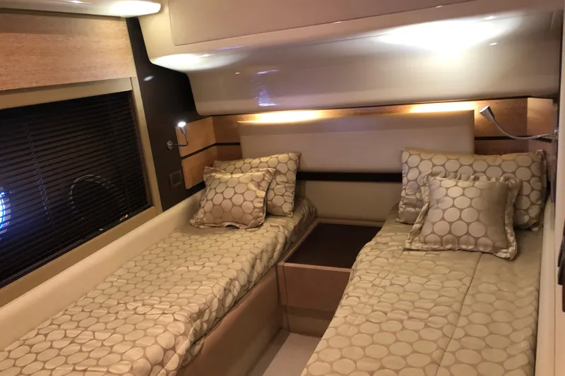  Yacht Photos Pics Luxurious twin cabin interior of 2014 Azimut Fly 60 yacht with elegant bedding.
