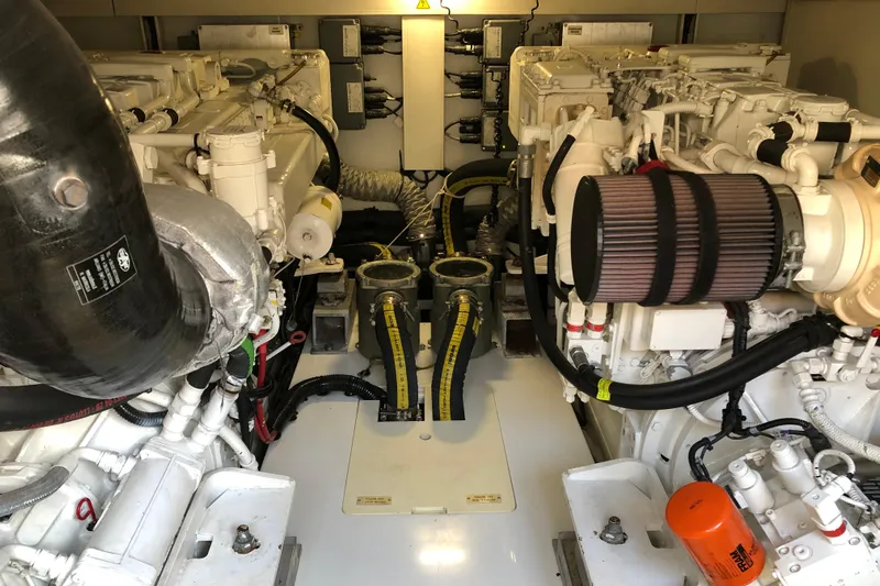  Yacht Photos Pics Engine room of a 2014 Azimut Fly 60 yacht, showcasing mechanical components.