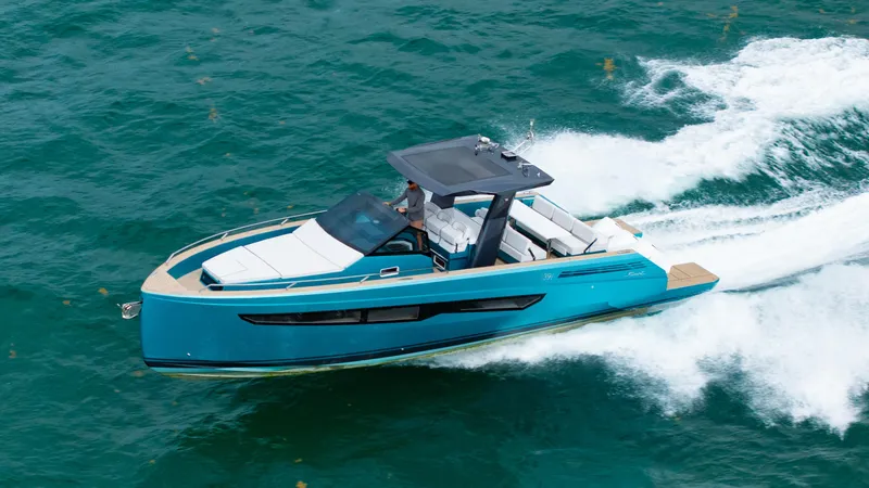 Strade Blu Yacht Photos Pics 2024 Fiart 39 Seawalker cruising on turquoise water, showcasing sleek design and performance.