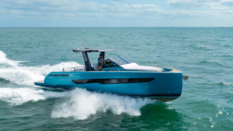 Strade Blu Yacht Photos Pics 2024 Fiart 39 Seawalker yacht cruising on open sea under cloudy sky.