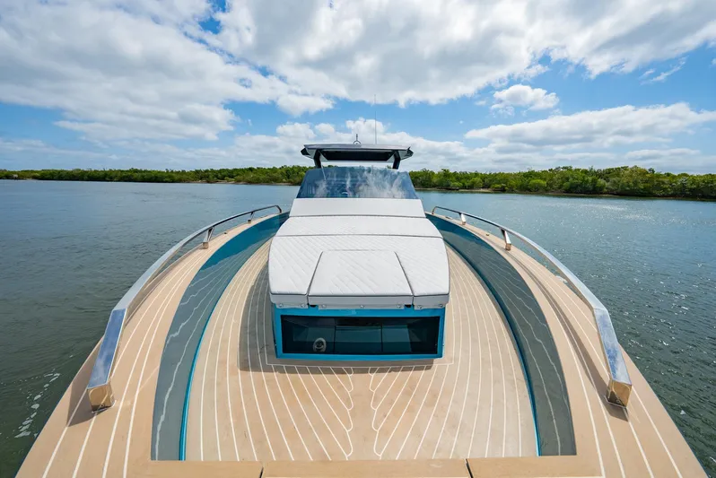 Strade Blu Yacht Photos Pics 2024 Fiart 39 Seawalker yacht on calm water, showcasing sleek deck design.