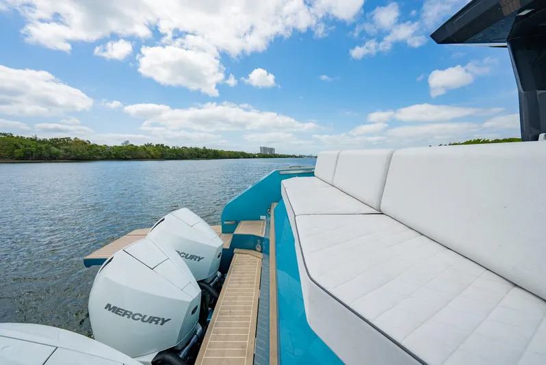 Strade Blu Yacht Photos Pics 2024 Fiart 39 Seawalker yacht with Mercury engines, featuring sleek white seating and scenic water view.