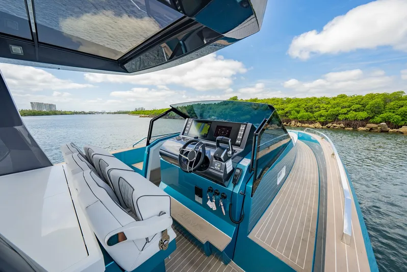 Strade Blu Yacht Photos Pics 2024 Fiart 39 Seawalker yacht helm, featuring modern controls and sleek design on open water.