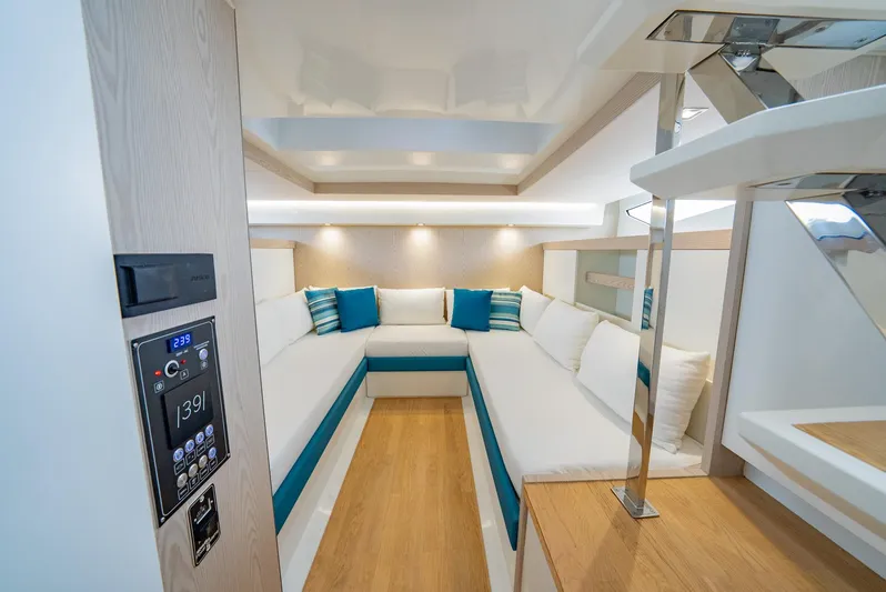 Strade Blu Yacht Photos Pics 2024 Fiart 39 Seawalker interior with modern seating and ambient lighting.