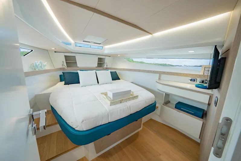Strade Blu Yacht Photos Pics Luxurious cabin interior of 2024 Fiart 39 Seawalker yacht with modern design and cozy bedding.