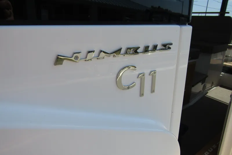  Yacht Photos Pics 2025 Nimbus Commuter 11 boat logo on white surface.